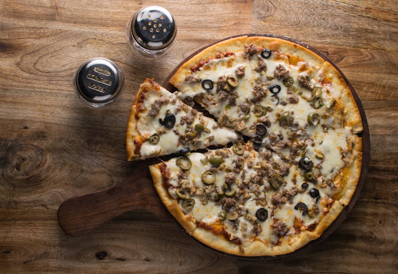 Cowboy Ranch pizza with smoked sausage and jalapeño